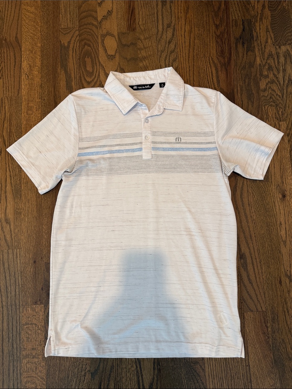 Travis Mathew White Polo with Light Blue Stripe | Size M
